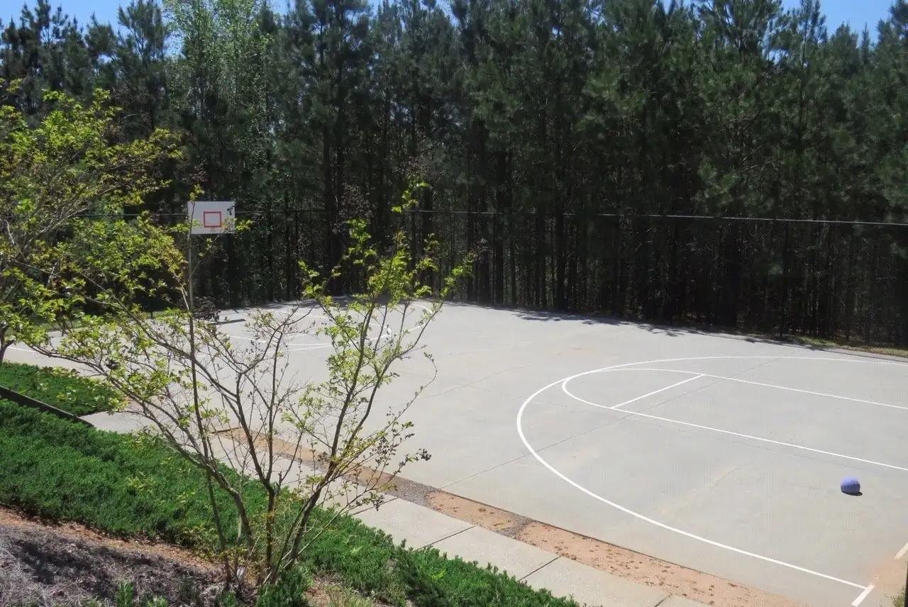 Basketball court surrounded by woods at Chaparral Ridge